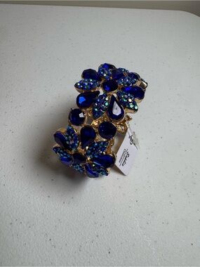 Gold-Tone Bracelet with Deep Blue Crystal Flowers
